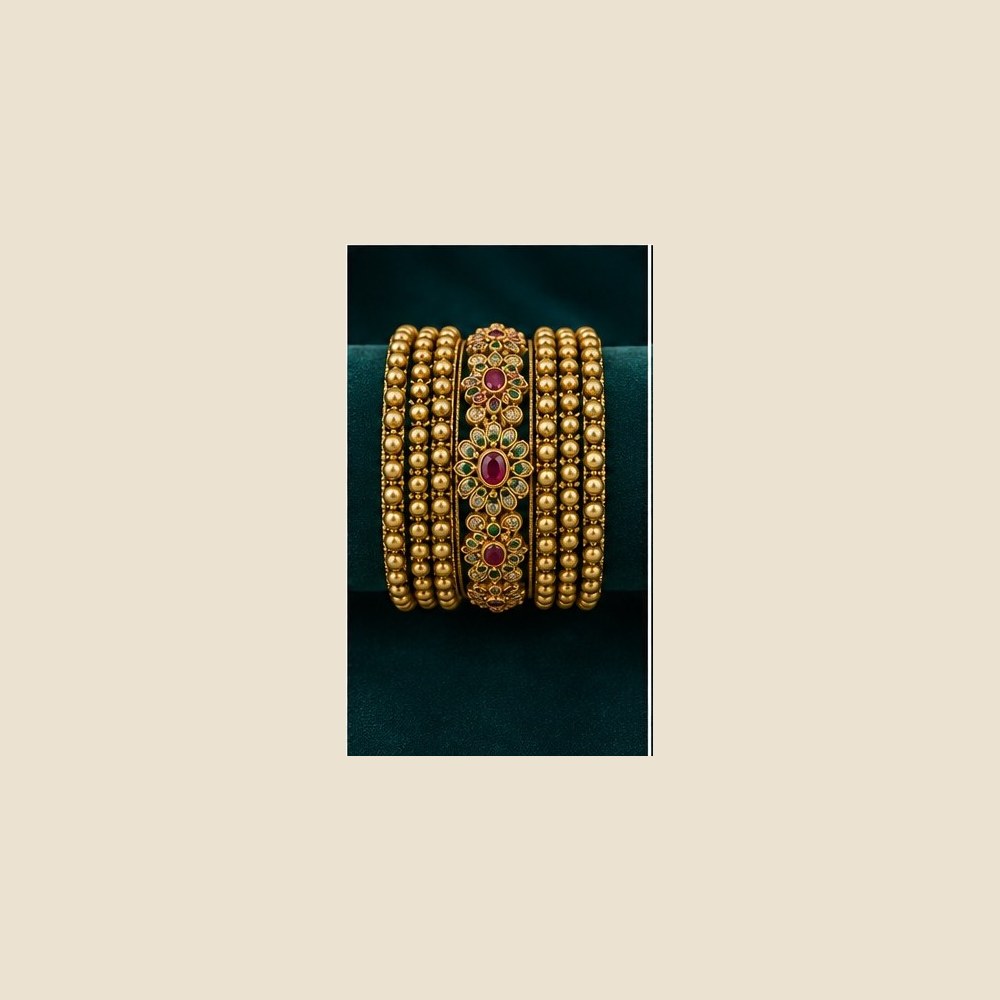 Ruby centred floral medallion bangles